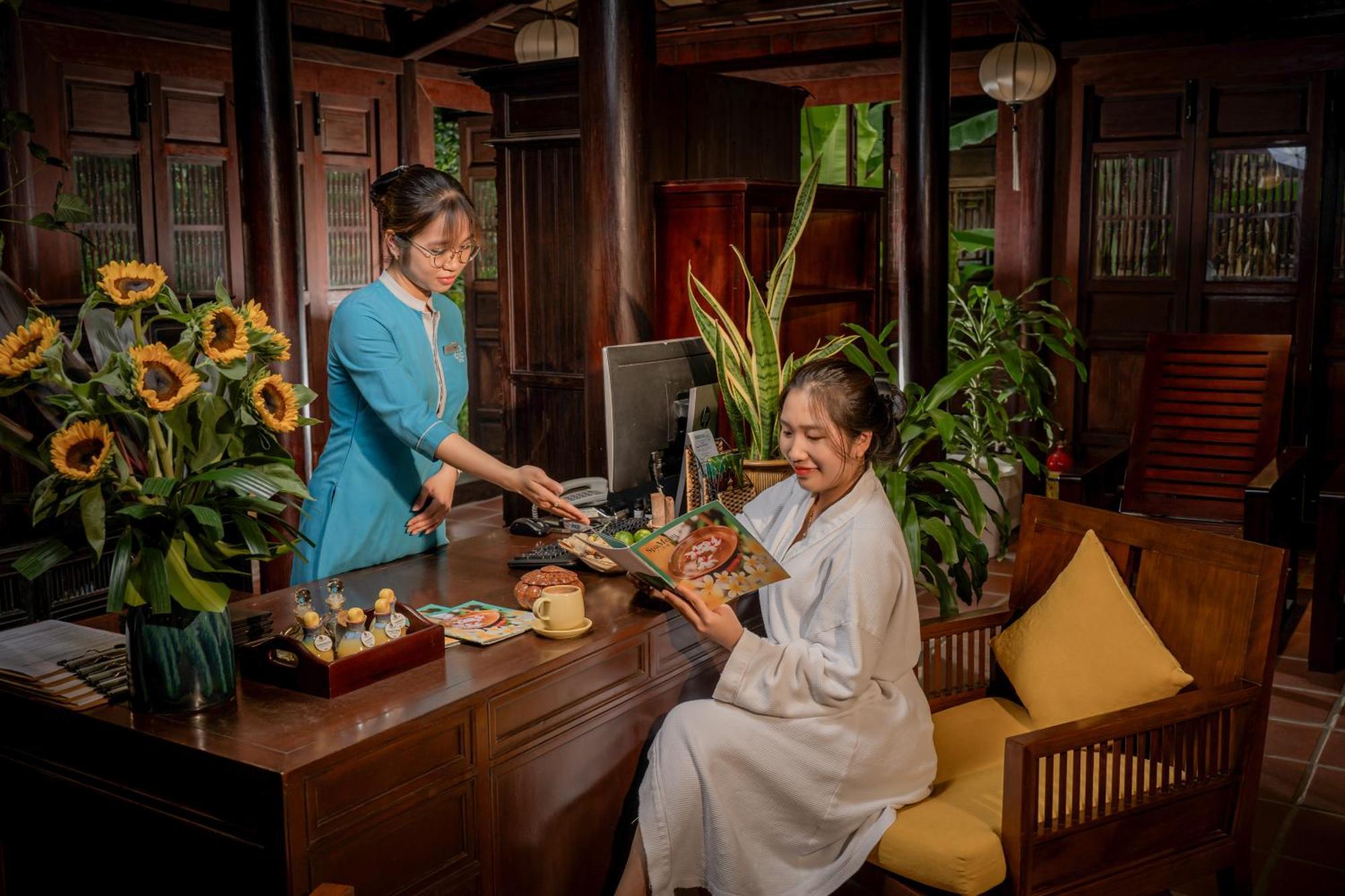 Rivertown Hoi An Resort & Spa Exterior foto Reception at the hotel